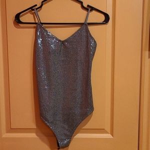 Sparkly silver body suit